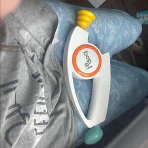 Bop It! Handheld Game with White and Orange Design